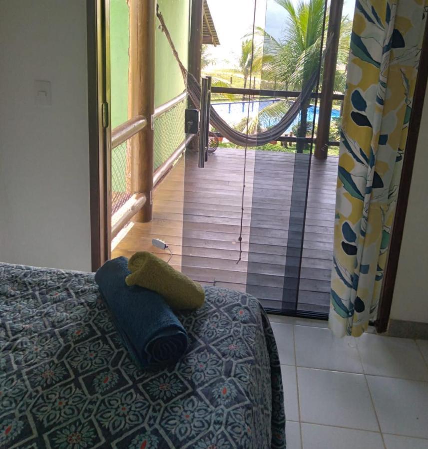 Bungalow frente a Praia Itacimirim Bagian luar foto
