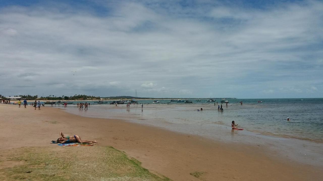 Bungalow frente a Praia Itacimirim Bagian luar foto